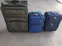 (3) Suitcases