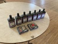 (7) Seal Saver Bottles W/ (2) Wheel Seals