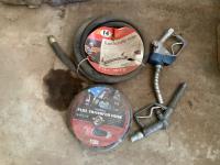 (2) New Fuel Hoses and (2) Used Nozzles 