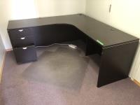 Office Desk with Contents and Clear Floor Mat