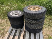 (4) BF Goodrich 205/75R14 M/S Tires On Gold Rims and (3) Cavalier 175/70R13 Tires on Rims 