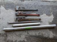 (3) 24 Inch Pipe Wrenches, Brico Pry Bar and (2) Aluminum Pipes