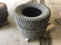 (3) Yokohama 265/70R17 Tires, (2) Nexen Roadian Ax 235/80R17 Tires and (3) Plastic Wheel Trims