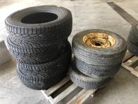 (3) Uniroyal Tiger Paw 215/75R15 Tires with Rims and (4) Nokian 275/65R18 Studded Tires