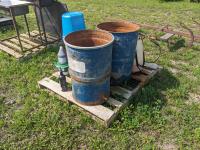 (2) Steel Barrels, Qty of Feed Buckets, (2) 12 Liter Sprayers