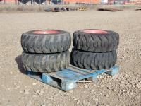 (4) 12x16.5 Skid Steer Tires with Rims