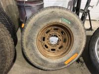 (1) Grabber TR 235/85R16 Tire and Steel 8 Bolt Rim