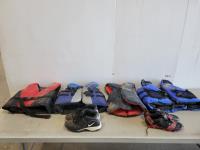 (4) Lifejackets and (2) Pairs of Cleats