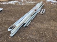 (2) 16 Ft Barn Door Tracks and Qty of Tin Trim