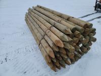 (65) 4-5 Inch 12 Ft Pointed Treated Posts