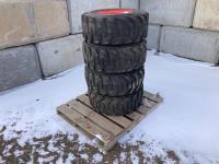 (4) 12-16.5 N. H. S. Skid Steer Wheels and Tires