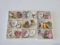 (9) Boxes of Porcelain Broches