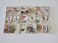 (9) Boxes of Porcelain Broches