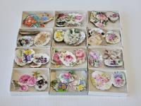 (12) Boxes of Porcelain Broches