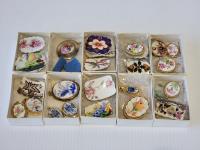 (10) Boxes of Porcelain Broches