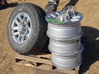 (4) Aluminum Rims For 2500 Chev, (1) New BF Goodrich265/70R18, (2) Blizzaks 255/70R18 Tires