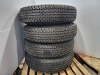 (4) Grizzly Tires 235/85R16