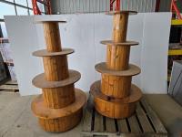 (2) Four Tier Round Wooden Display Units On Castors