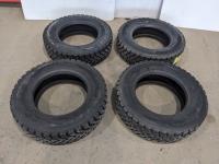 (4) Grizzly 215/75R17.5 Tires