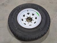 Grizzly 235/85R16 Tire On 8 Bolt Rim