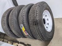 (4) Grizzly 235/85R16 Tires On 8 Bolt Rims