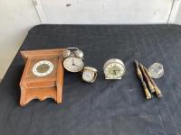 (4) Clocks, (4) Stamps & Glass Jar 