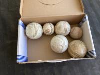(4) Softballs & (2) Baseballs