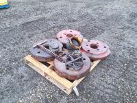 4 Vinatge Tractor Weights and Old Snatch Blocks