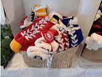 Basket of Hockey Socks and Toques