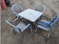 Plastic Patio Table with (3) Chairs and (1) Folding Camp Chair