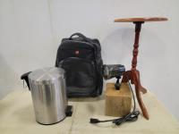 Small Trash Bin, Strobe Light, Swiss Gear Carry On Luggage and Small Round Table