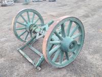 Antique Wagon Wheel Set with Axle Attached.