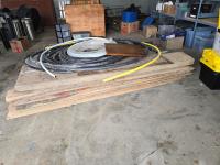 Qty of 3/4 Inch  Plywood and Plumbing Hose